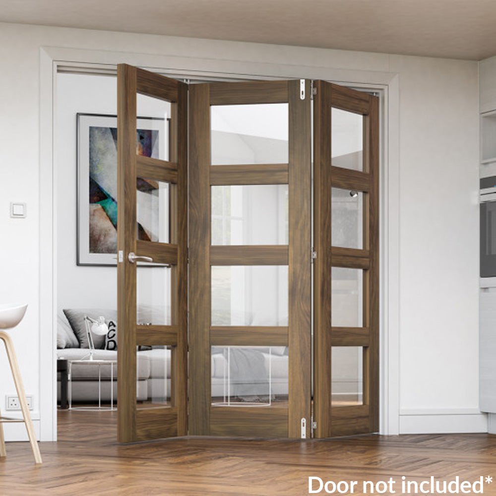 Lifestyle prefinished walnut bifold frame kit with glazed folding doors in a modern room