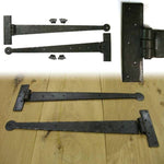 Lifestyle handforged arrowhead T hinges fitted to a timber plank door