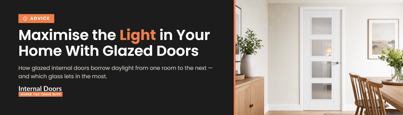 A clear glazed internal door letting daylight pass from a bright room into a hallway