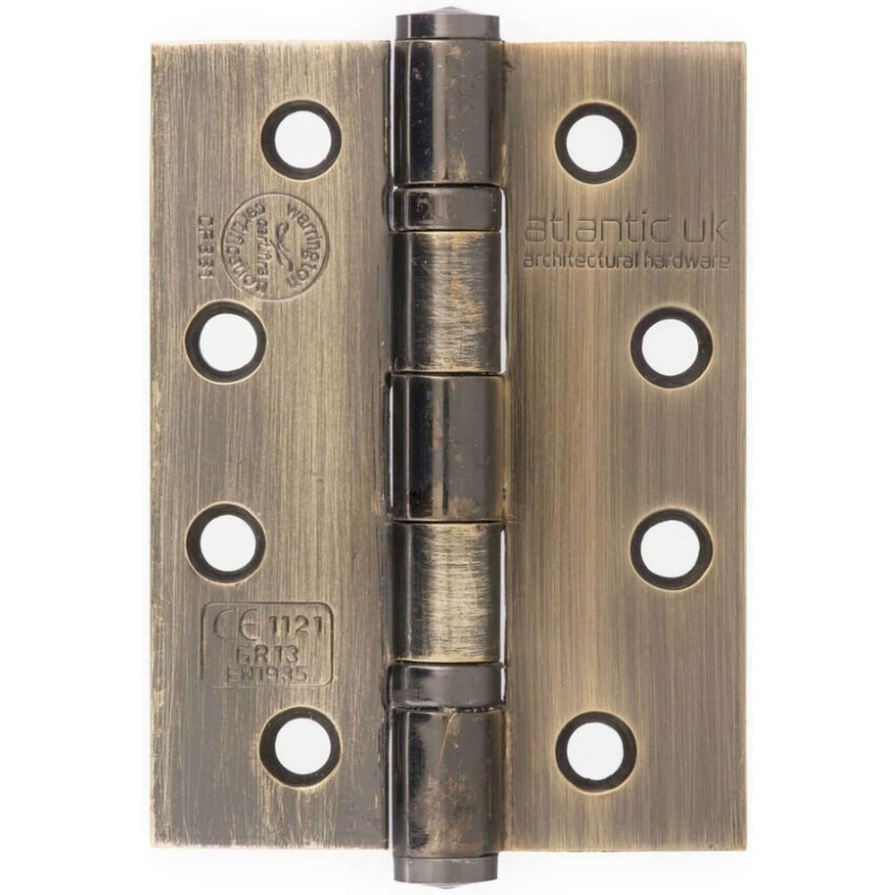 Lifestyle antique brass FD30 rated butt hinge fitted to a door