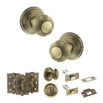 Product Old English Ripon antique brass reeded mortice door knob with matching hinges, latch and fixings