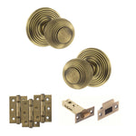 Product Old English Ripon matt antique brass reeded mortice door knob with matching hinges, latch and fixings