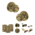 Product Old English Ripon matt antique brass reeded mortice door knob with matching hinges, latch and fixings