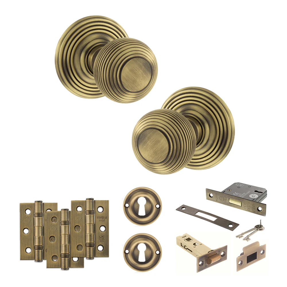 Product Old English Ripon matt antique brass reeded mortice door knob with matching hinges, latch and fixings