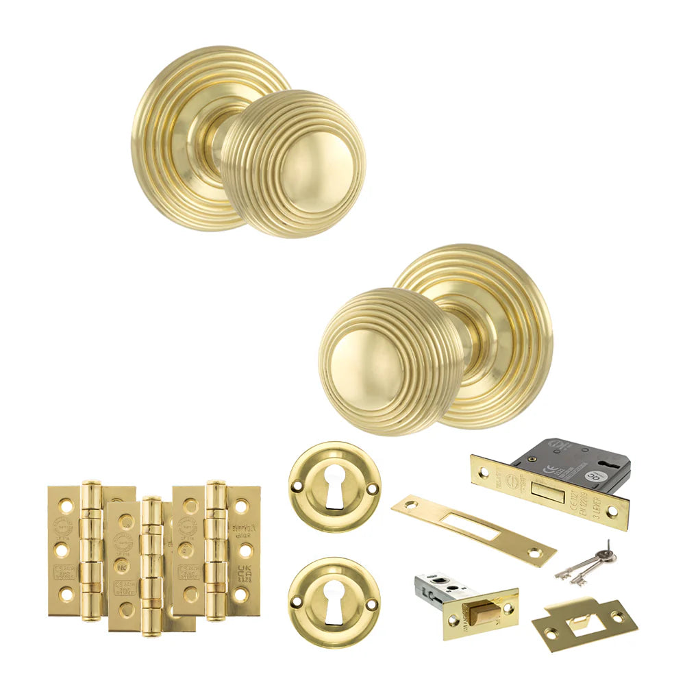 Product Old English Ripon polished brass reeded mortice door knob with matching hinges, latch and fixings