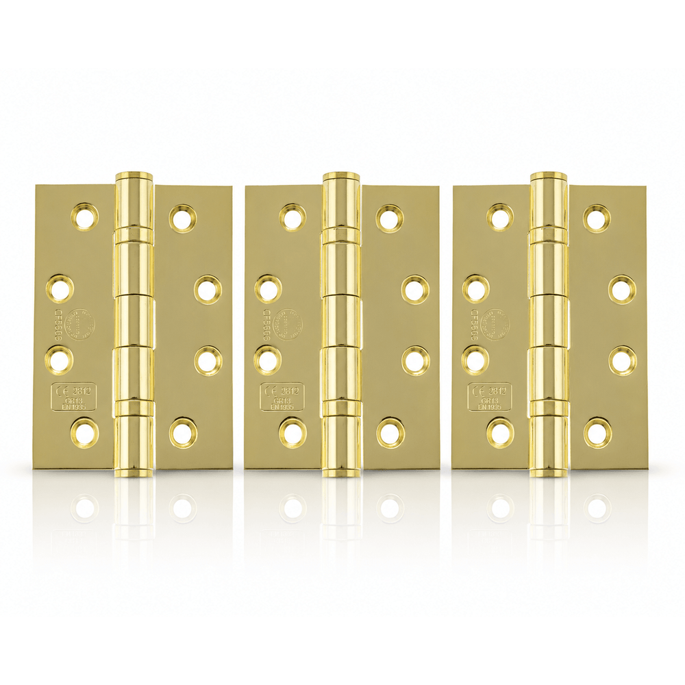 Product set of 3 polished brass 4" but hinges on a white background