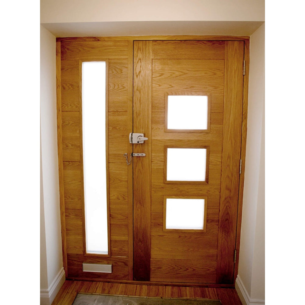 Lifestyle Adoorable Oak Arta glazed external oak veneer door installed at an entrance