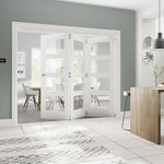 Lifestyle prefinished white primed bifold frame kit with white glazed folding doors