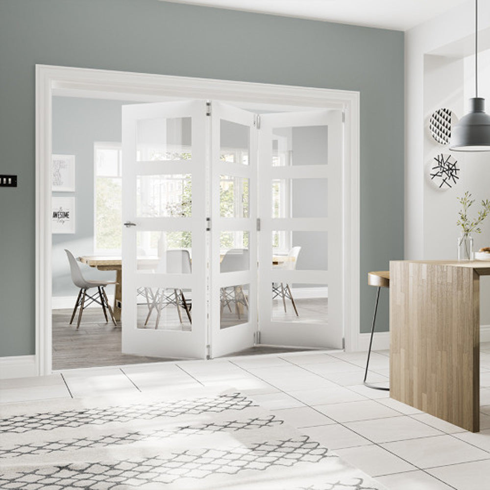 Lifestyle prefinished white primed bifold frame kit with white glazed folding doors
