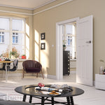 Lifestyle white primed Cambridge solid internal door in a bright room with pale walls