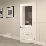 Door with oval and glazing on top ajar in a lifestyle setting