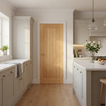 Lifestyle Deanta Ely prefinished oak FD60 fire door in a cream kitchen interior