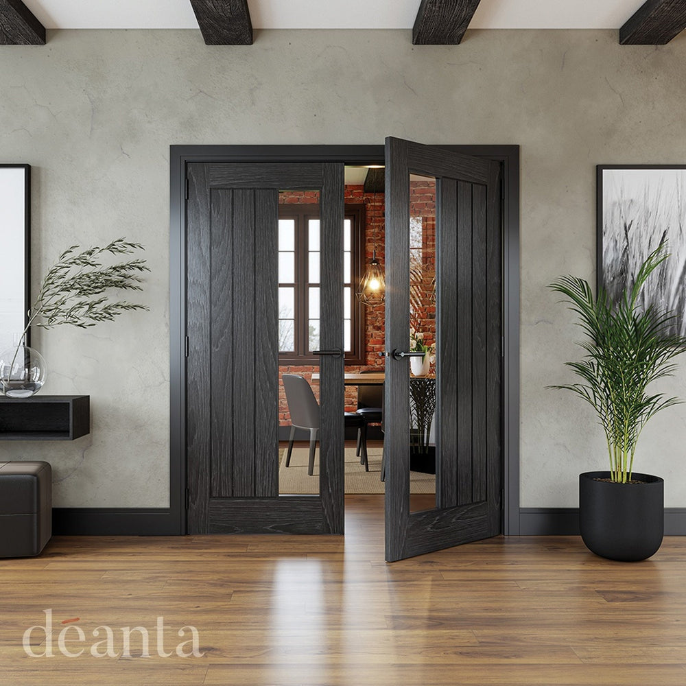 Lifestyle Deanta Ely brushed black oak clear glazed door in a room setting