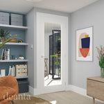 Lifestyle Ely white primed glazed internal door installed in a light grey room