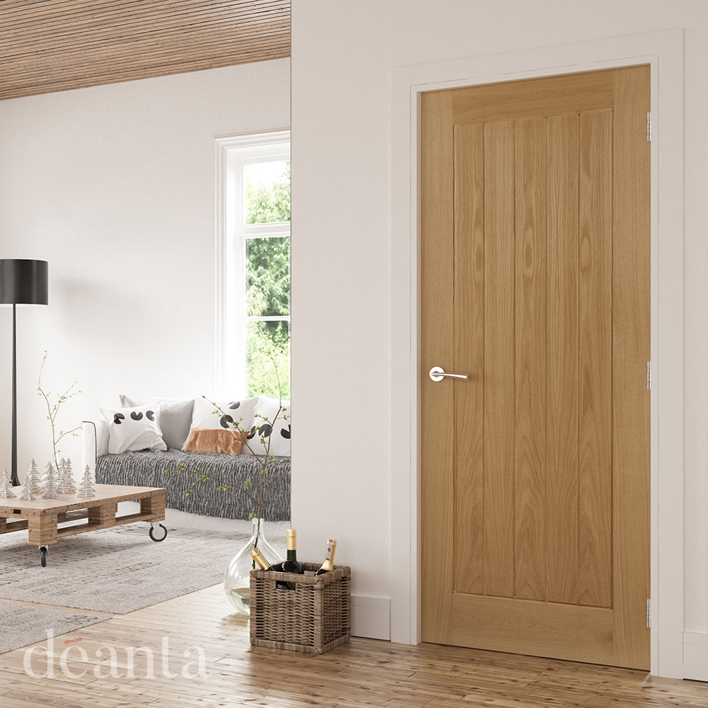 Lifestyle Ely oak internal door with vertical grooved panels in a home interior