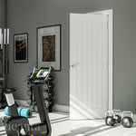 Deanta Ely white primed FD60 fire door in a light interior