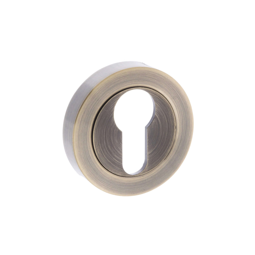 Product euro escutcheon pair on round rose in polished chrome finish