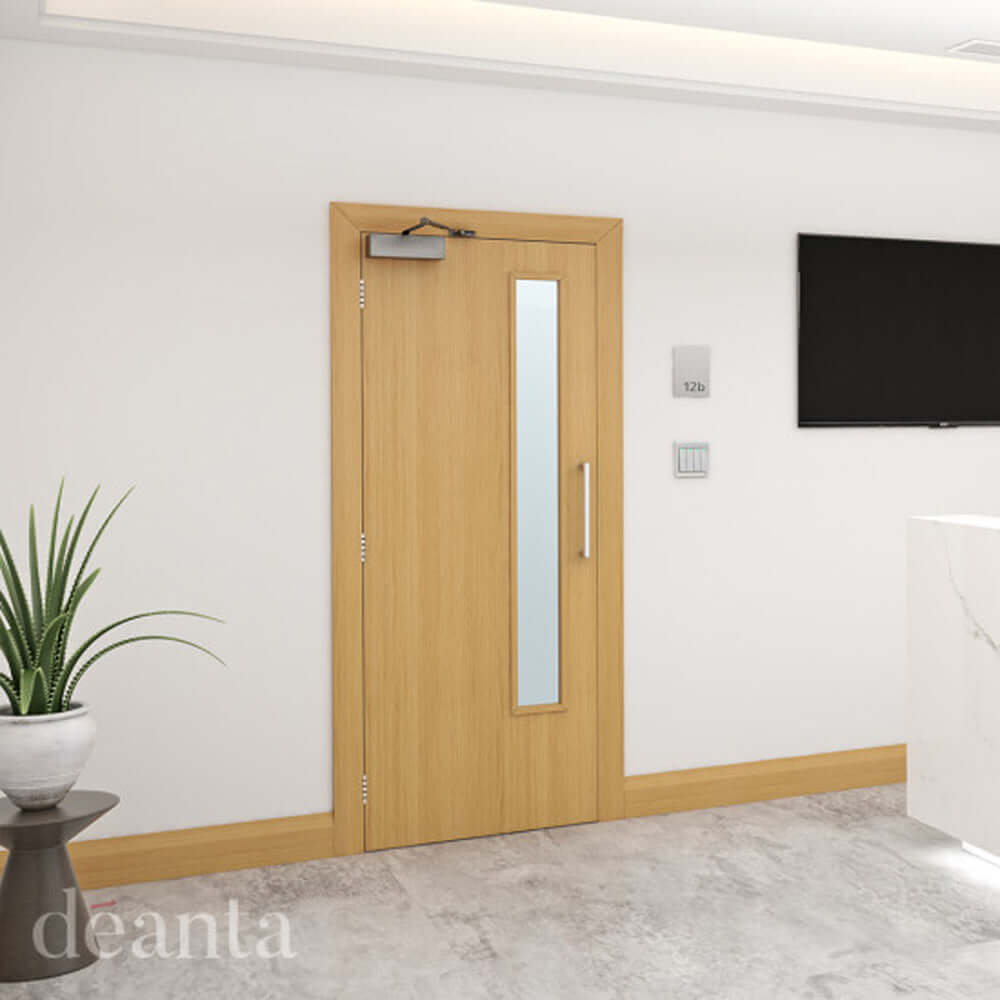 Lifestyle flush prefinished oak glazed FD30 fire door in a modern office interior