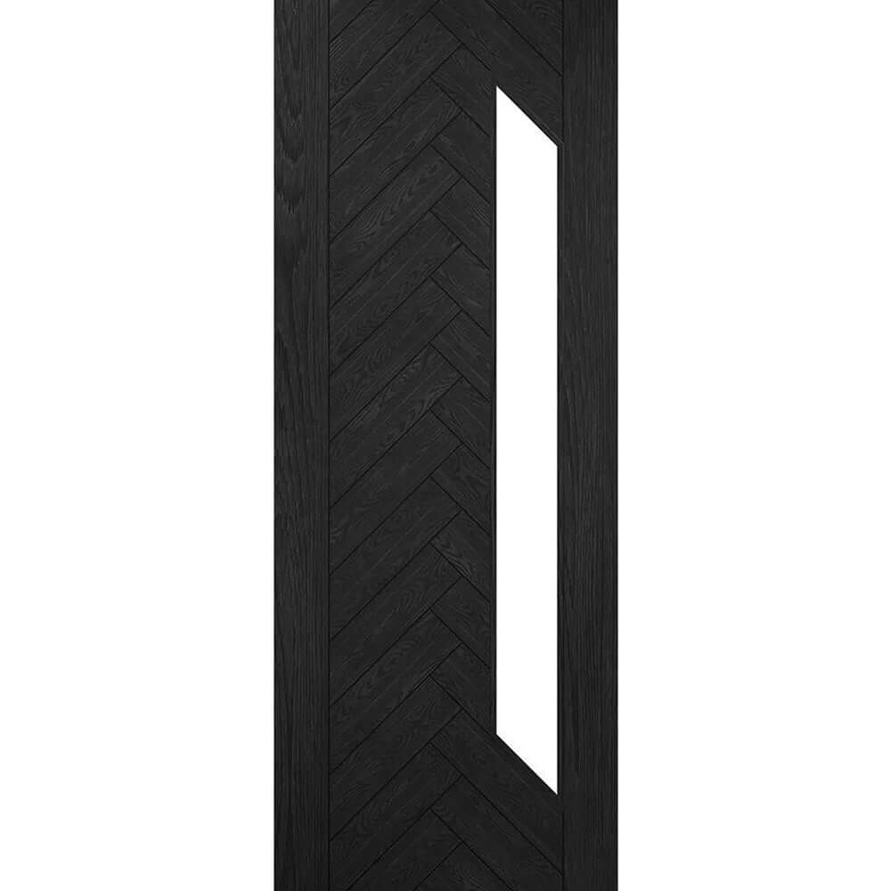 Black door with a geometric pattern and a rectangular window on a white background