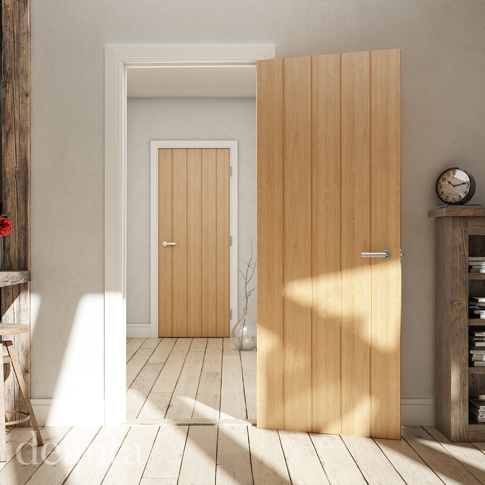 Lifestyle Galway oak vertical panel internal door in a bright home interior