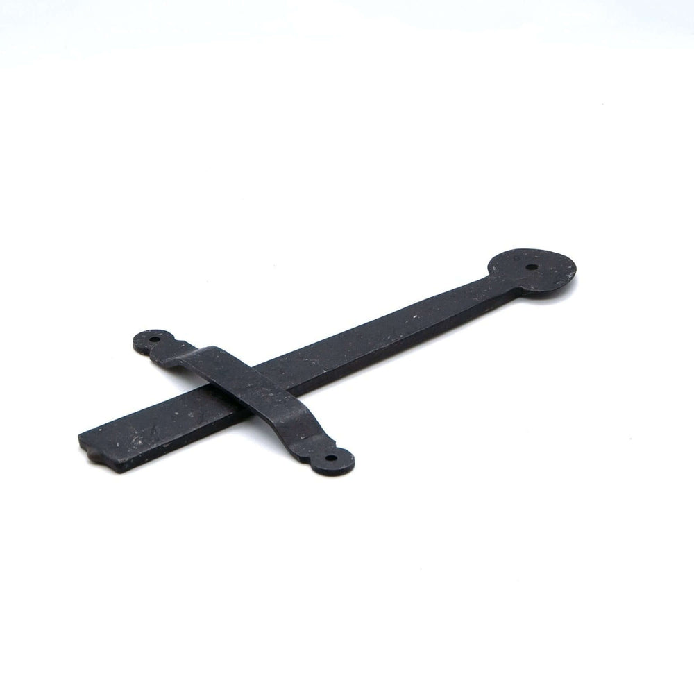 Lifestyle hand forged Suffolk latch set on a natural wood door