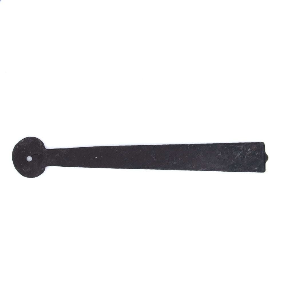 Lifestyle hand forged Suffolk latch set close-up on a wooden door
