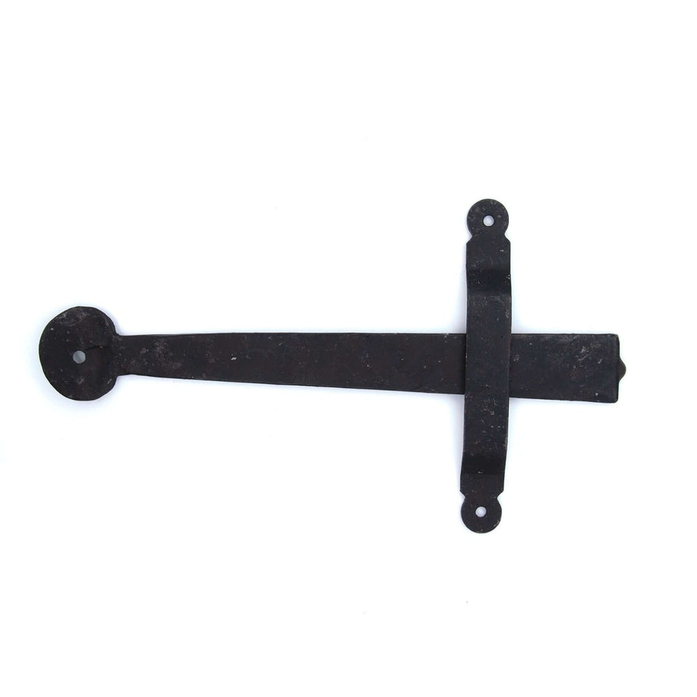 Lifestyle hand forged Suffolk latch set on a rustic ledged door