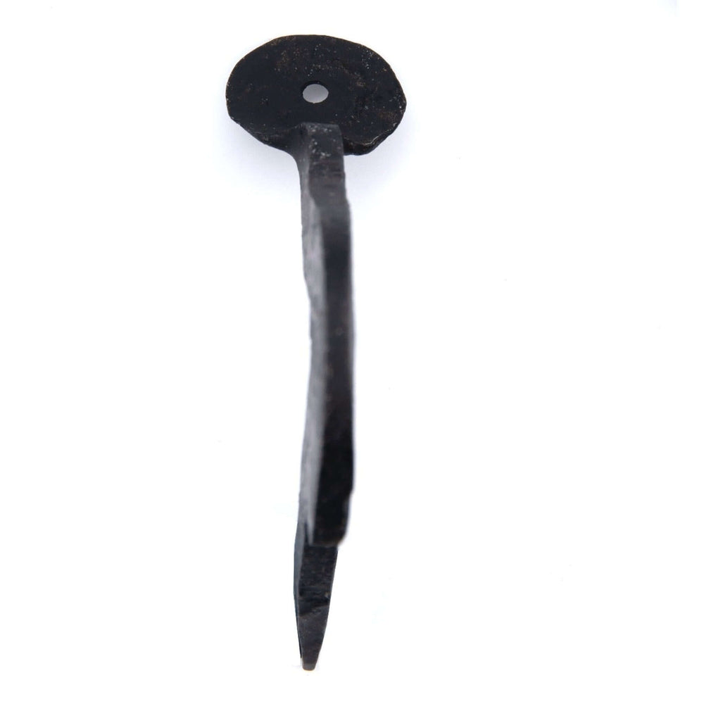 Lifestyle hand forged Suffolk latch set detail on a wooden door
