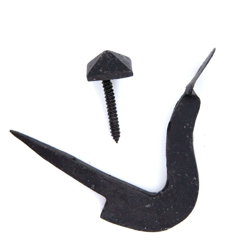 Lifestyle hand forged Suffolk latch set on a rustic wooden door