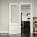 Lifestyle white primed Madison clear glazed internal door in a bright room with neutral decor