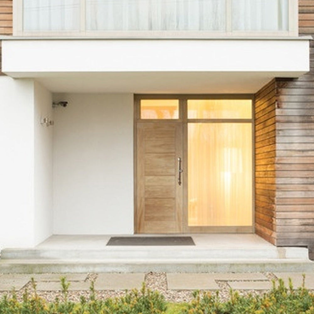 Lifestyle Modica four-panel oak external door installed at an entrance