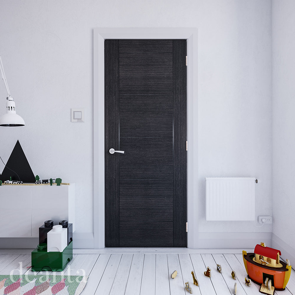 Lifestyle Montreal grey ash solid internal door in a bright room with neutral decor