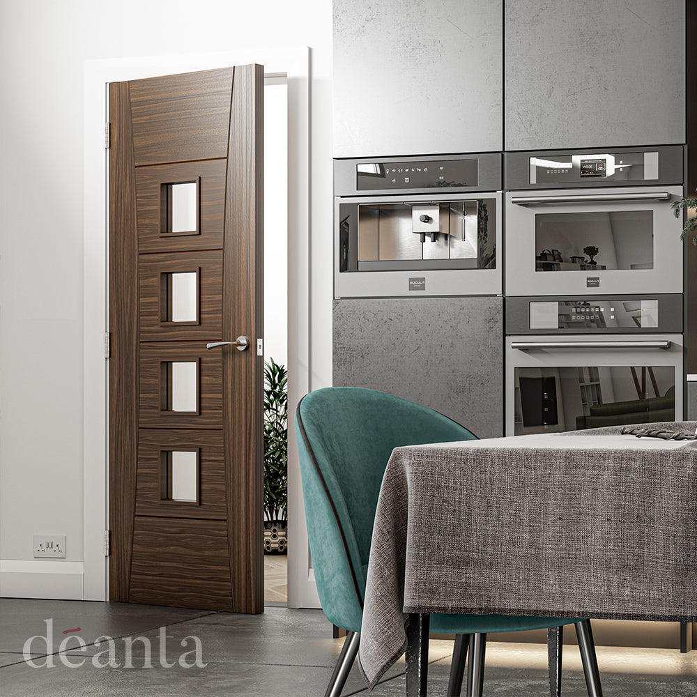 Lifestyle walnut Pamplona clear glazed internal door in a bright room with warm wood tones