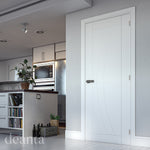 Lifestyle white primed Ravello solid internal door in a clean light interior