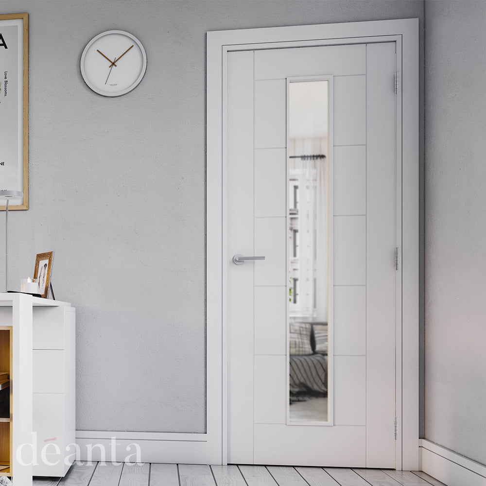 Lifestyle white primed Seville clear glazed internal door in a bright room with soft neutral decor