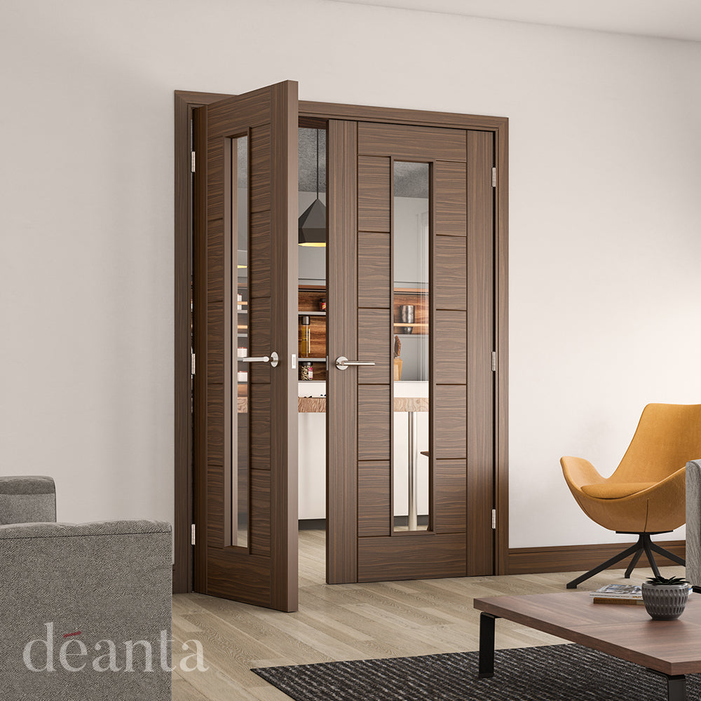 Lifestyle walnut Seville clear glazed double doors open into a living space