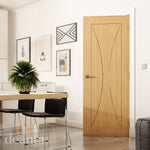 Lifestyle oak Sorrento solid internal door in a light interior with natural wood tones