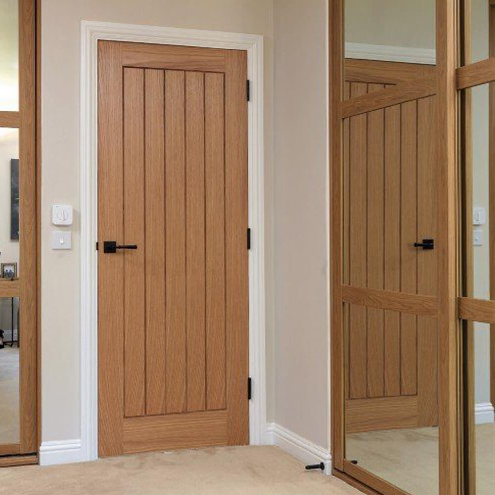 Lifestyle unfinished oak veneered Thames internal door installed in a bright room