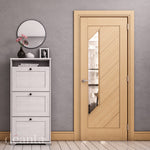Lifestyle oak Torino clear glazed internal door in a bright room with neutral decor