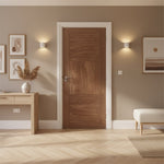 Lifestyle Tres prefinished walnut internal fire door installed in a neutral room