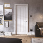 Lifestyle white Mexicano internal door in a modern room with neutral decor