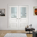 Lifestyle white primed glazed internal door in a bright interior
